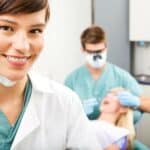 female hygienist in the foreground